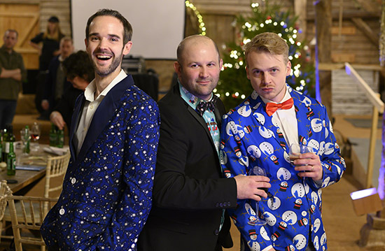 The tech guys sporting Christmas suits